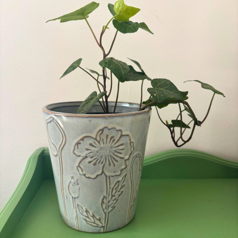 Cache-pot fleuri